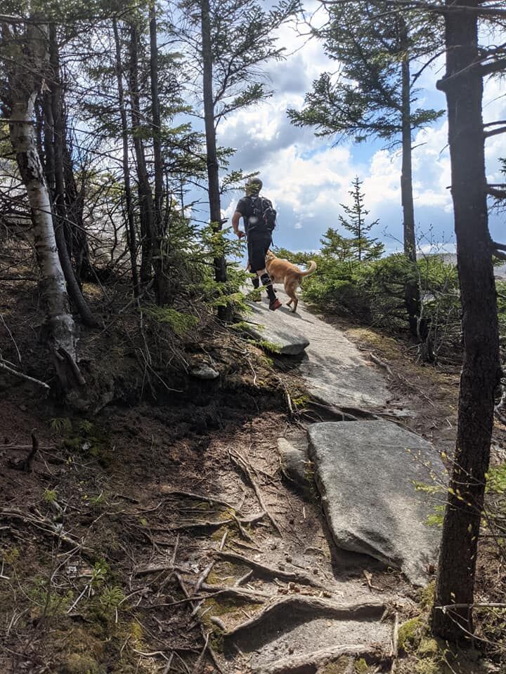 Adam reaches the ridge.jpg